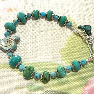 Turquoise and Czech Glass Bracelet featuring a Czech Glass Bird.